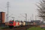 Die 185 399 fuhr am 24.3.12 mit dem 43664 von Salzburg nach Neuss Gbf.Hier bei der Durchfahrt durch Dormagen-Bayerwerke.