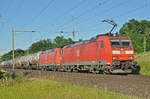 Doppeltraktion, mit den DB Loks 185 109-5 und 185 122-9, fahren Richtung Bahnhof Kaiseraugst.