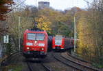 185 014-8 und 185 163-3  beide von DB und fahren durch Aachen-Schanz mit einem langen Ölzug aus Antwerpen-Petrol(B) nach Basel(CH) und kommen aus Richtung Aachen-West in Richtung