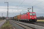 Mit dem  nothegger -KLV fuhr am 11.12.2016 die 185 285-4 durch die Gleisanlagen von Müllheim (Baden) auf der KBS 703 in Richtung Schweizer Grenze.