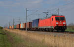 185 252 führte am 11.04.19 einen Containerzug durch Braschwitz Richtung Köthen.