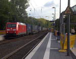 185 004-9 DB  kommt als Umleiter aus Richtung Aachen-West mit einem Containerzug aus Zeebrugge(B) nach Gallarate(I) und fährt durch Kohlscheid in Richtung Herzogenrath,Mönchengladach.