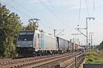 Ausfahrt am Nachmittag des 12.09.2018 von Rpool/RTX 185 677-2 mit ihrem Containerzug nach Belgien aus dem Überholgleis von Müllheim (Baden) in Richtung Freiburg (Breisgau).