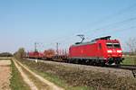 Am Nachmittag des 02.04.2020 fuhr 185 127-8 mit dem gemischten Güterzug EZ 44601 (Kehl - Basel SBB RB) südlich von Buggingen über die Rheintalbahn in Richtung Müllheim (Baden).