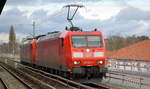 DB Cargo AG [D] mit einem Lokzug mit  185 081-7  [NVR-Nummer: 91 80 6185 081-7 D-DB] +  185 145-0  [NVR-Nummer: 91 80 6185 145-0 D-DB] am Haken am 28.01.21 Berlin Karow.