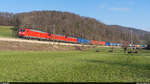 Dreifachtraktion DB 185 mit führender 185 129 mit UKV-Zug am 6. März 2021 zwischen Tecknau und Gelterkinden.