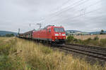 185 167-4 ist mit einem gemischten Güterzug am 31.08.2022 bei Reilos unterwegs.