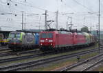 DB - 185 097-3 + 185 112-0 mit Güterzug unterwegs im Bahnhofsareal des Bahnhof Basel Bad.