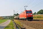DB Cargo 185 196 mit kurzem Kesselwagenzug in Richtung Hannover (Langwedel, 26.08.2016).