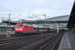 185 348 mit einem gemischten Güterzug am 4.3.10 in Hannover Messe/Laatzen