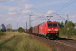 185 297-9 mit einem gemischten Güterzug in Riedstadt-Wolfskehlen am 10.08.11