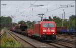 185 375 mit einem gemischten kurzen Güterzug am 06.08.11 bei der Durchfahrt von Düsseldorf Rath
