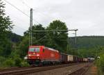 185 232-6 der DB Schenker Rail zieht eine gemischten Güterzug in Richtung Köln, hier am 30.06.2012 bei Betzdorf (Sieg).