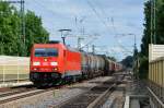 185 370-4 mit einem gemischten Güterzug (Plattling-Nürnberg Gbf) bei der Durchfahrt in Sünching, 07.08.2012