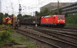185 312-6 von Railion kommt aus Richtung Köln mit einem gemischten Güterzug aus Osnabrück nach Kortenberg-Goederen(B) und fährt in Aachen-West bei der Abendstimmung am 21.9.2012.