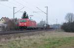 185 283-9 mit einem KLV-Sattelaufliegerzug Richtung Österreich bei Obertraubling, 05.04.2013