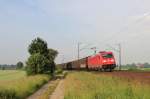 Am 19.Juni 2013 war DBSR 185 377 mit Hbis-Wagen bei Burgstemmen auf dem Weg Richtung Norden.