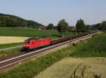 Die 185 112 mit einem Güterzug am 13.07.2013 unterwegs bei Einöd.