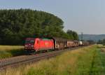 185 302 mit einem Güterzug am 06.07.2013 bei Himmelstadt.