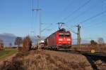 Am 07.12.2013 bespannte 185 085-8 einen gemischten Güterzug, als sie auf der KBS 703 bei Müllheim (Baden) gen Schweiz fuhr.