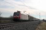 Am 18.01.2014 fuhr die Mannheimer 185 134-4 mit einem gemischten Güterzug südlich vom Hp Buggingen in Richtung Norden.