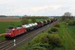 Am 18.04.2014 ist 185 093-2 mit einem gemischten Güterzug nördlich von Hügelheim  auf der KBS 703 in Richtung Schweiz unterwegs.