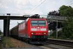 Durchfahrt am 11.07.2014 von 185 136-9 mit einem gemischten Güterzug in Orschweier.