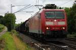 Mit einem gemischten Güterzug fuhr 185 128-6 am 12.07.2014 beim Abzweig Leutersberg am Fotografen in Richtung Freiburg vorbei.