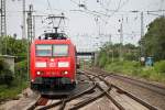 Einfahrt am 23.07.2014 in Müllheim (Baden) von 185 192-2 mit einem gemischten Güterzug von Gleis 13 auf Gleis 5.