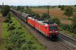 Am 22.08.2014 bespannte die 185 116-1 zusammen mit der 185 131-0 einen gemischten Güterzug aus Richtung Schweiz bei Auggen.