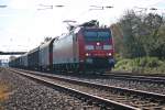 Durchfahrt am 19.10.2014 von 185 094-0 mit einem gemischten Güterzug in Orschweier gen Norden.