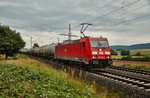 185 380-3 ist am 09.08.16 mit einen Kesselzug in Richtung Gemünden unterwegs,gesehen bei Harrbach.