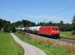 Die 185 252 mit einem Kesselzug am 20.08.2016 unterwegs bei Hufschlag.