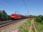 Die 185 234 mit einem Autozug am 10.07.2016 unterwegs bei Taufkirchen a.
