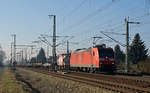 185 025 verlässt mit einem gemischten Güterzug am 14.02.17 den Rangierbahnhof Engelsdorf Richtung Riesa.