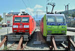 Re 485 014-5 der BLS Cargo AG (BLSC) und 185 129-4 DB sind im Bahnhof Spiez (CH) am Prellbock abgestellt.