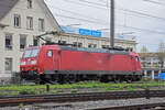 DB Lok 185 097-3 durchfährt am 12.04.2023 solo den Bahnhof Pratteln.
