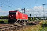 Als Lokzug war am Nachmittag des 06.06.2017 die ATLU/RHC 2065 (185 630-1) von Basel Bad Bf unterwegs in Richtung Norden, als sie bei Müllheim (Baden) gen Buggingen fuhr.