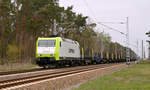 185 503 der Captrain schleppte am 12.04.19 den Stahlzug nach Zeithain durch Marxdorf.