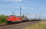 185 584 verlässt mit einem Kesselwagenzug am 20.07.19 das Ausweichgleis in Landsberg Richtung Halle(S).