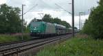 Die 185 517-0 der ITL fuhr am 14.07.2012 mit einem Güterzug von Emden gen Osten, hier bei Veenhusen.