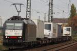 MRCE 185 554 ( damals bei Hectorrail im Einsatz) am 20.10.12 mit einem KLV nach Ehrang in Duisburg-Bissingheim.