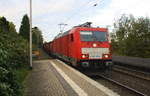 186 328-1 DB-Schenker kommt mit einem Schrottzug aus Köln-Kalk(D) nach Genk-Goederen(B) und kommt aus Richtung Mönchengladbach-Hbf,Rheydt-Hbf,Wickrath,Beckrath,Herrath und fährt durch Erkelenz in Richtung Baal,Hückelhoven-Baal,Brachelen,Lindern,Süggerath,Geilenkirchen,Frelenberg,Zweibrüggen,Übach-Palenberg,Rimburg,Finkenrath,Hofstadt,Herzogenrath, Kohlscheid,Richterich,Laurensberg,Aachen-West. 
Aufgenommen vom Bahnsteig 1 in Erkelenz. 
Bei Sonne und Wolken am Nachmittag vom 13.10.2017.