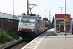 # Roisdorf 13
Die 186 106 von Railpool mit einem Güterzug aus Köln kommend durch Roisdorf bei Bornheim in Richtung Bonn/Koblenz.

Roisdorf
20.04.2018