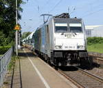 186 294-5 von Railpool kommt die Kohlscheider-Rampe hoch aus Richtung Mönchengladbach,Herzogenrath mit einem Kalkleerzug aus Oberhausen-West(D) nach Hermalle-Huy(B) und fährt durch Kohlscheid in Richtung Richterich,Laurensberg,Aachen-West. Aufgenommen von Bahnsteig 2 in Kohlscheid. 
Bei Sommerwetter am Nachmittag vom 17.5.2018.