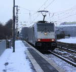 186 454-5 von Lineas/Railpool kommt als Lokzug aus Millingen(D) nach Aachen-West(D) und kommt die Kohlscheider-Rampe hoch aus Richtung Herzogenrath und fährt durch Kohlscheid in Richtung Richterich,Laurensberg,Aachen-West,Aachen-Schanz,Aachen-Hbf. 
Aufgenommen vom Bahnsteig 2 in Kohlscheid.
Bei schönem Sonnenschein und Schnee am Kalten Nachmittag vom 23.1.2019.