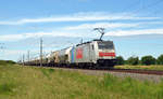 186 187 der Railppol führte für ihren Mieter Crossrail am 21.06.20 einen Silozug durch Braschwitz Richtung Köthen.