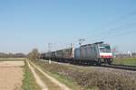 Mit einem  Ambrogio -Containerzug fuhr am frühen Nachmittag des 02.04.2020 die Rpool/XRAIL 186 288 südlich von Buggingen über die Rheintalbahn durchs Markgräflerland in Richtung