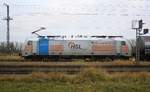 HSL 69569 mit Zuglok 186 551-8 D-RPool für HSL abfahrbereit im Bf Anklam.