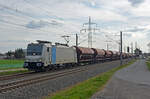 186 145 von Railpool schleppte am 06.04.22 einen Silozug durch Braschwitz Richtung Magdeburg.